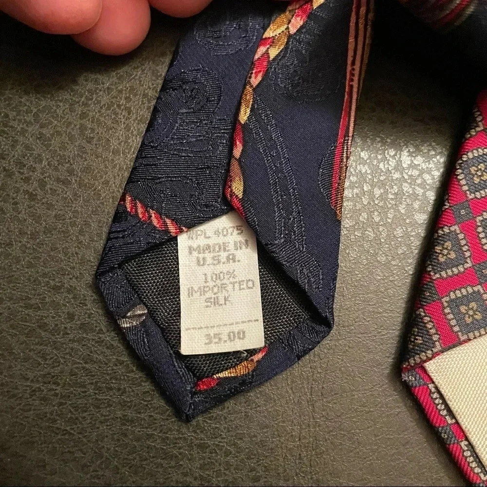 Two Vintage Oscar de La Renta Couture silk ties.